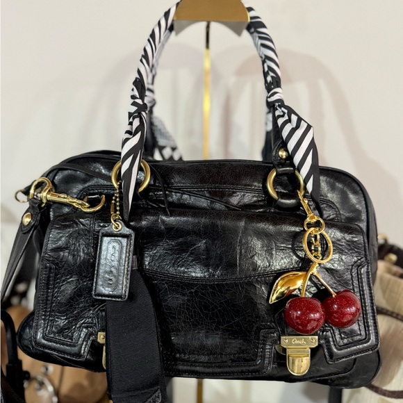 Coach Handbags - Coach Poppy Black Leather Handbag
